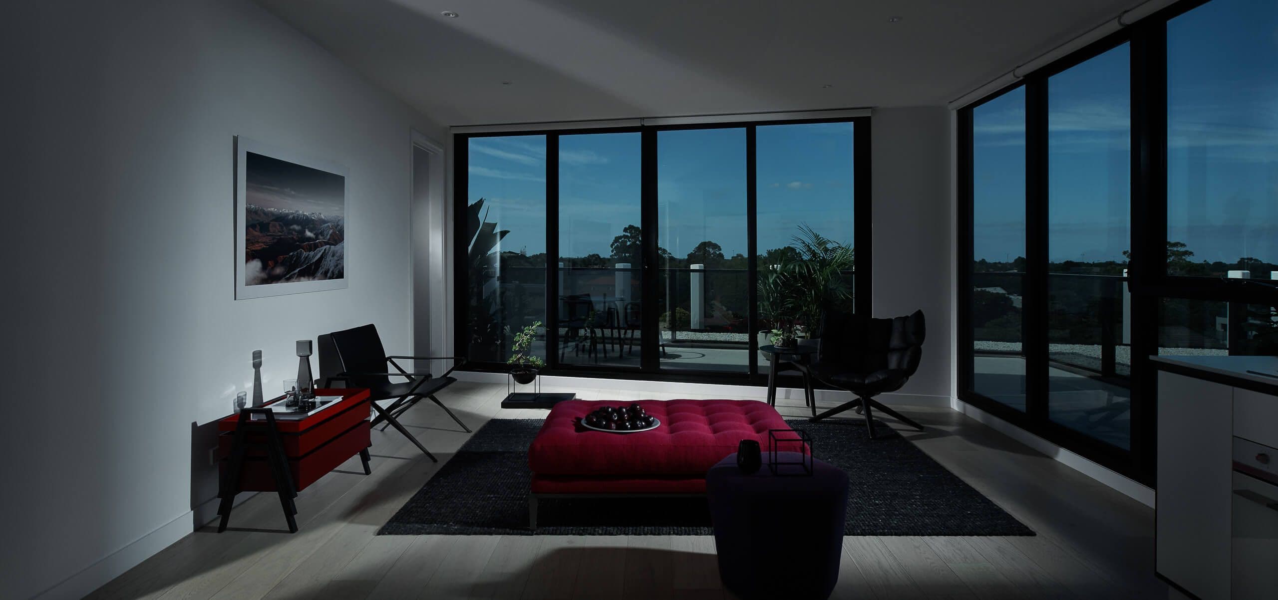 Apartment loungeroom with dark lighting
