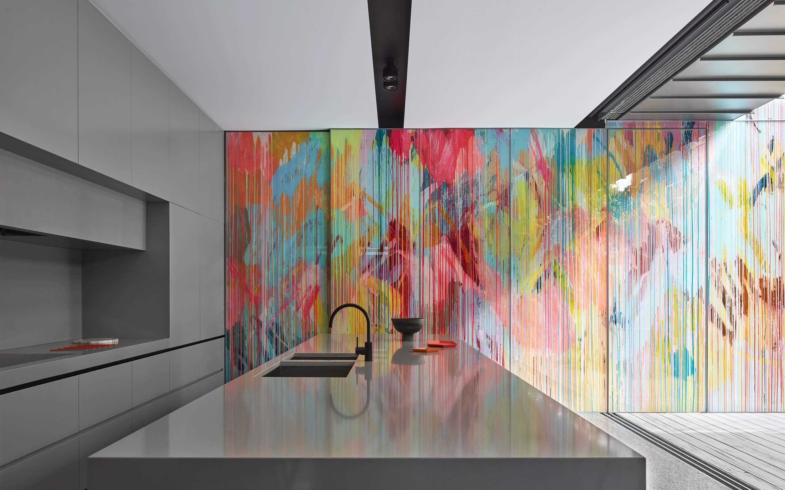 Kitchen counter with colourful wall