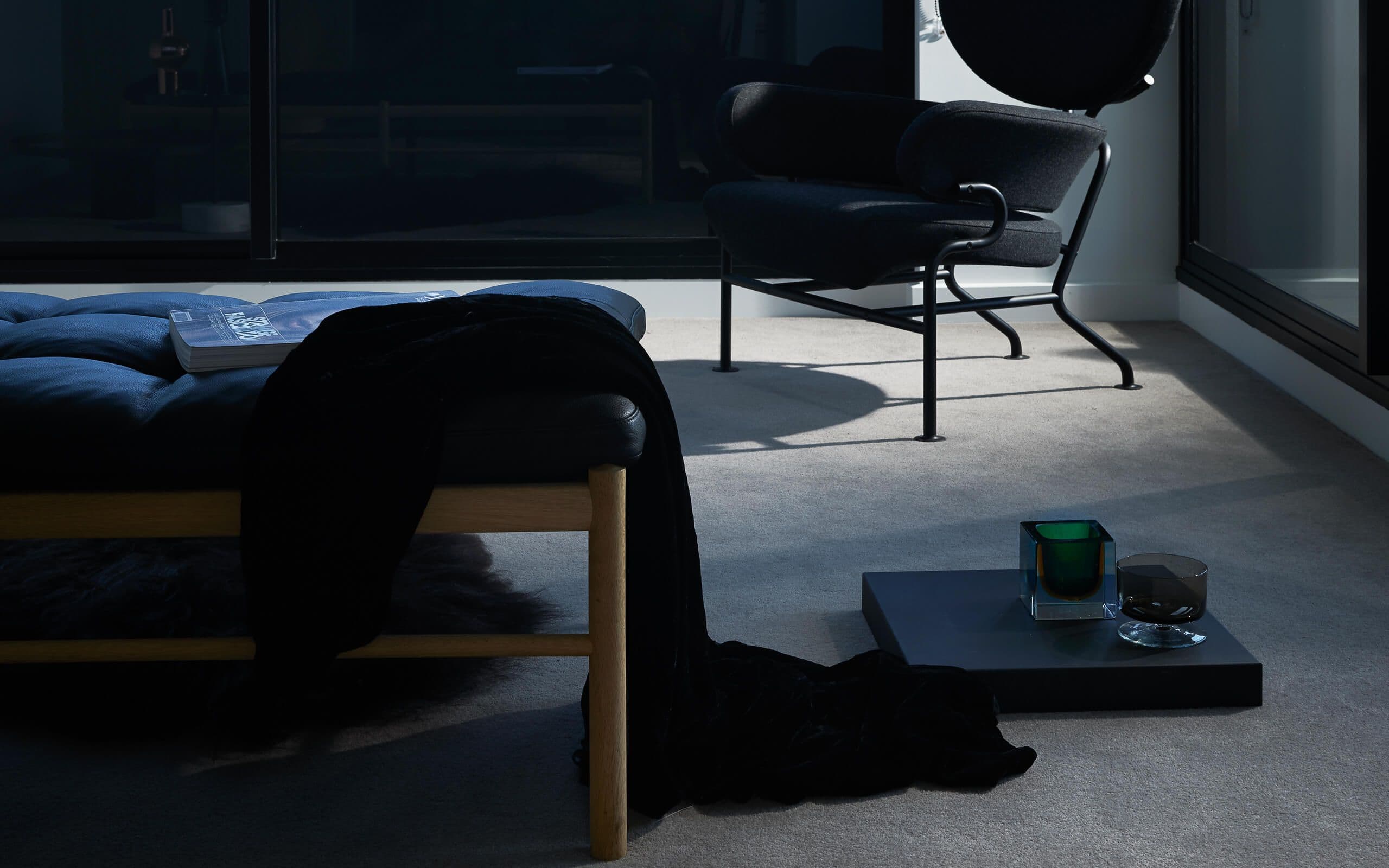 Floor details near seating in dark tones