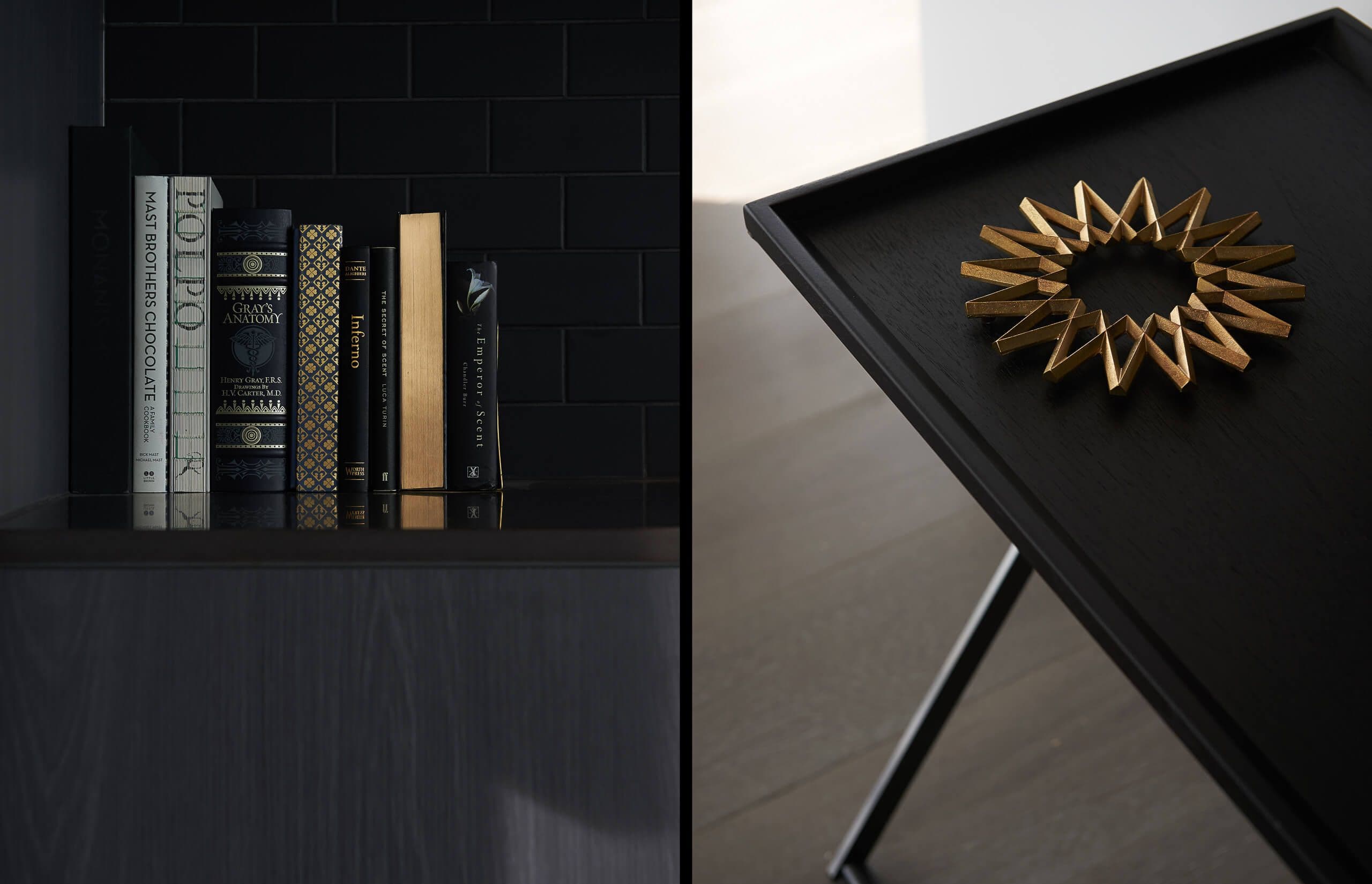 Split view of detail items on desk and shelf, dark, with gold accent