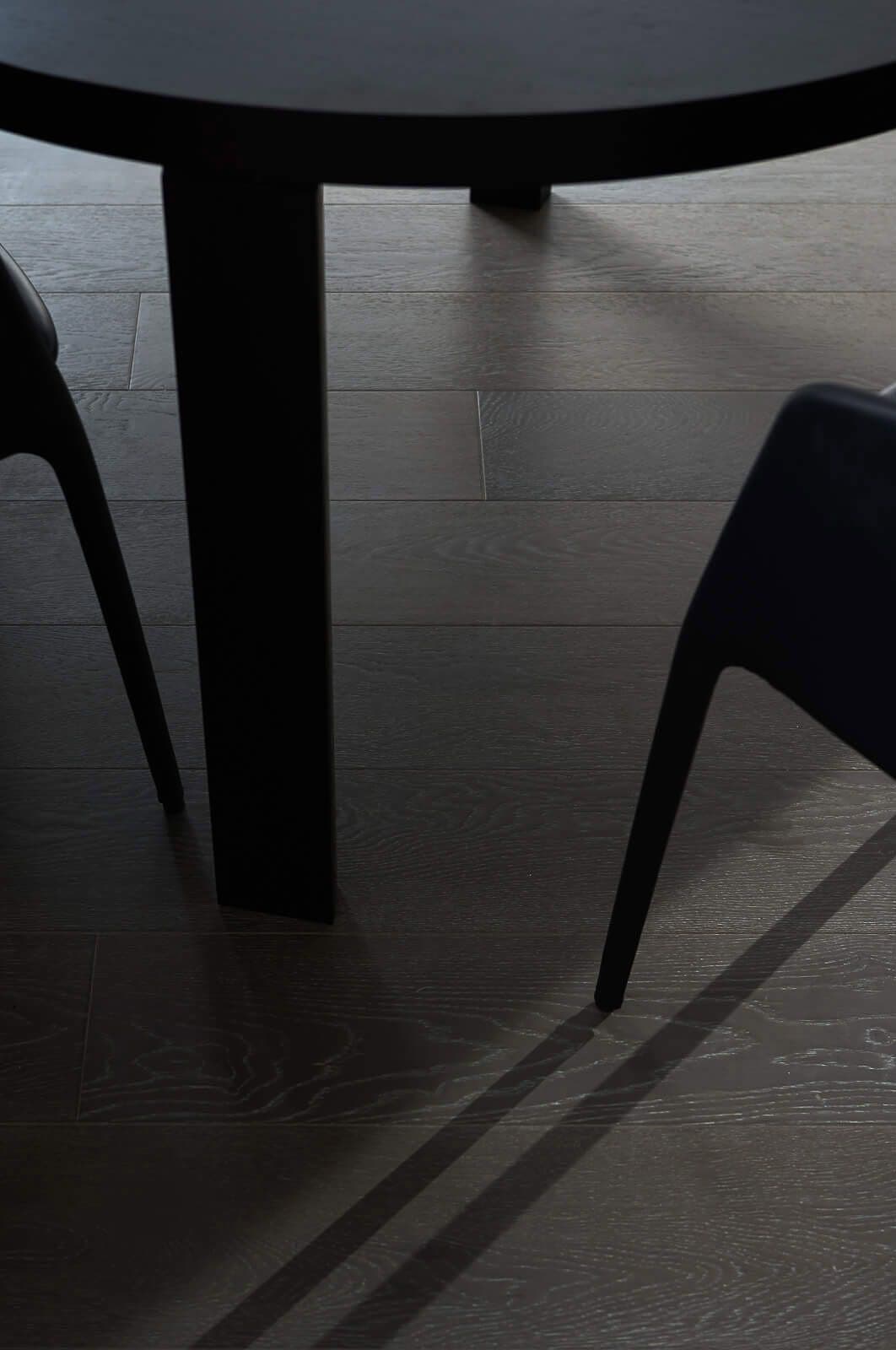 Shadows around dark furniture