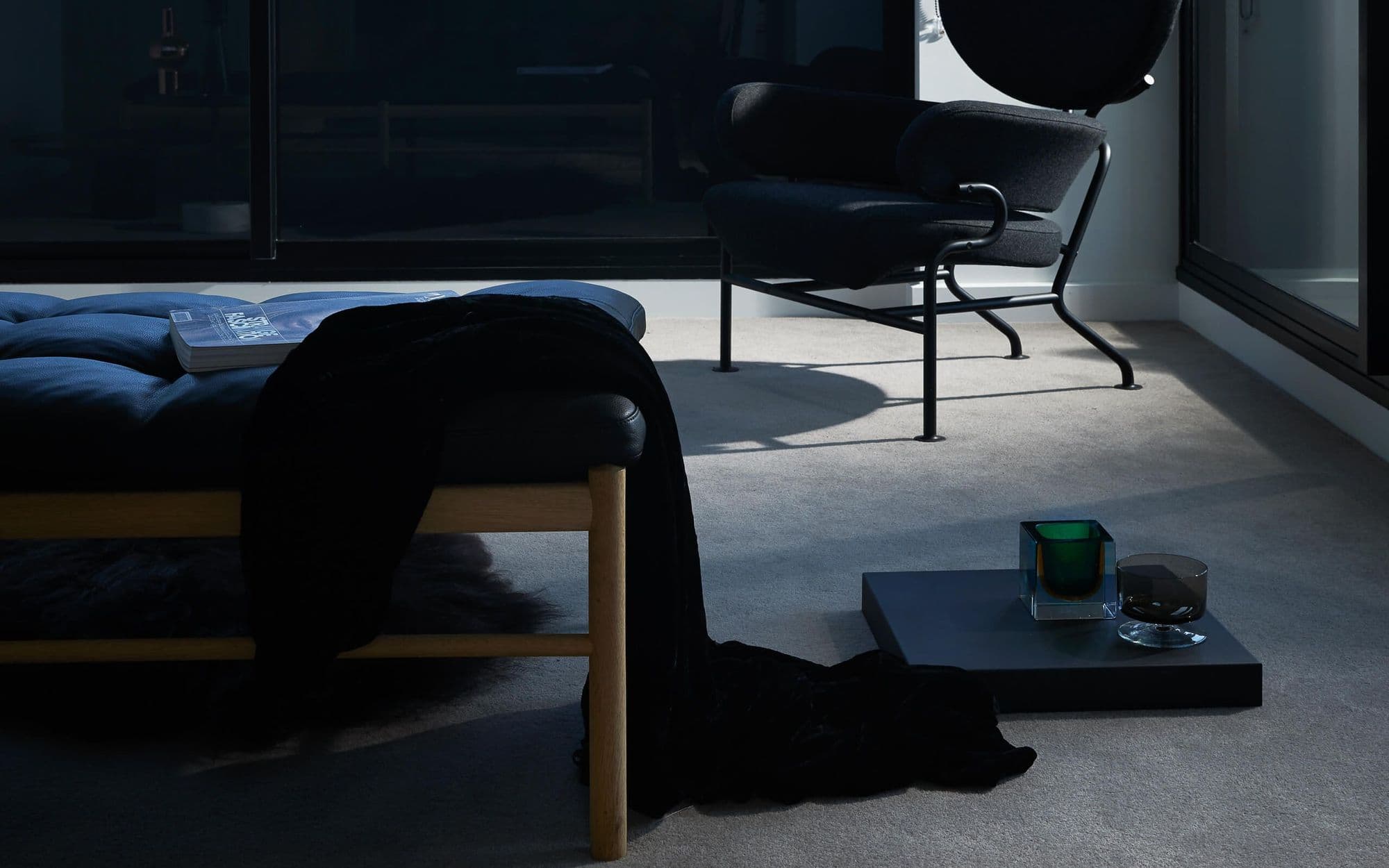 Floor details near seating in dark tones